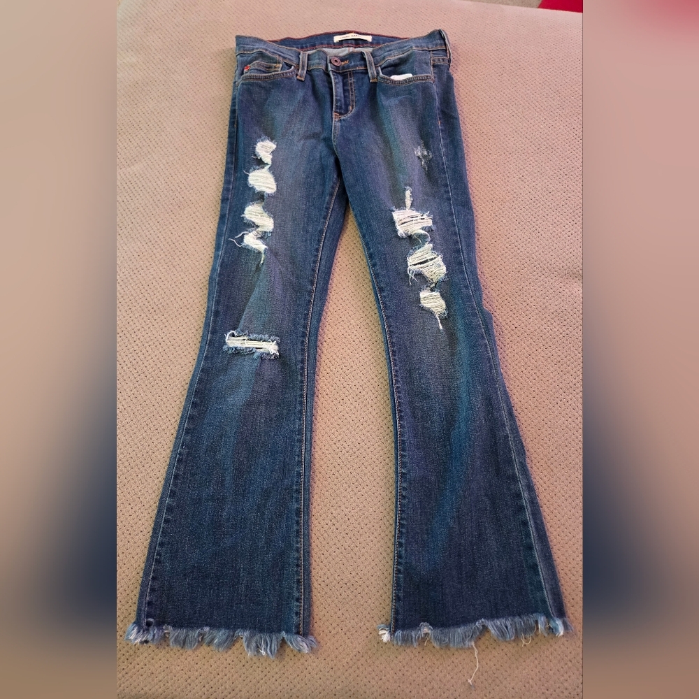 Angry Rabbit Women's size 27 /5 blue jeans raw distressed hem